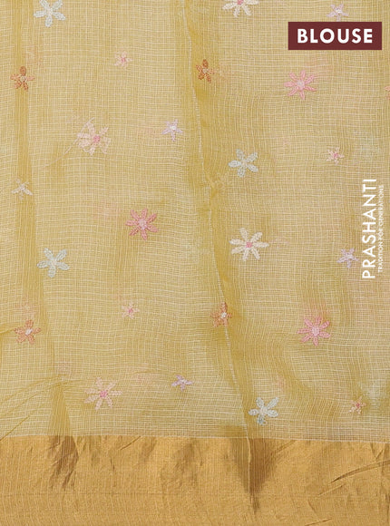 Silk kota saree yellow with allover floral embroidery work and zari woven border