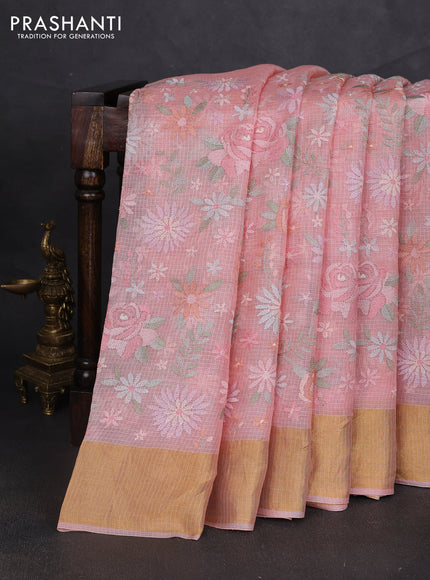 Silk kota saree peach shade with allover floral embroidery work and zari woven border