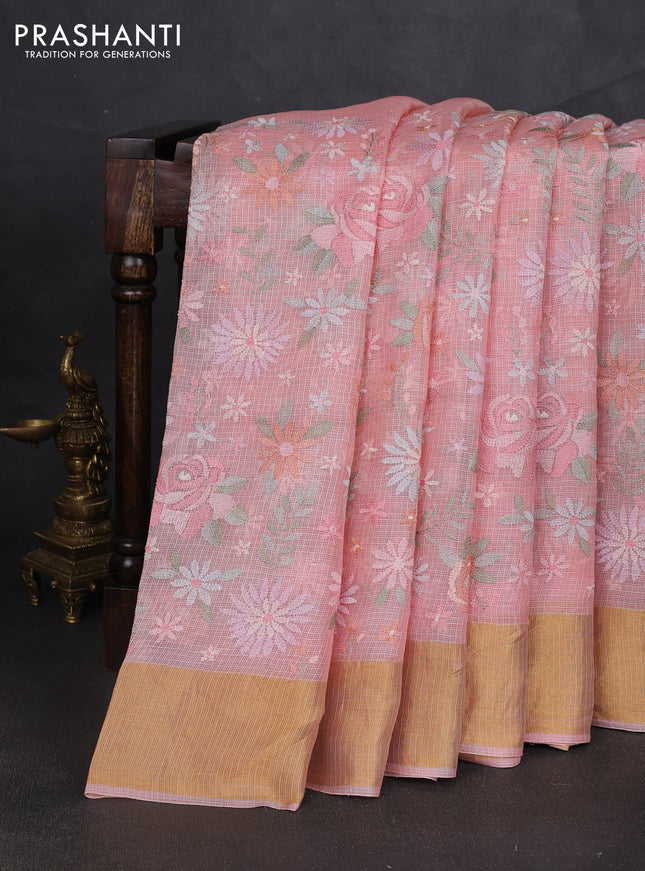 Silk kota saree peach shade with allover floral embroidery work and zari woven border