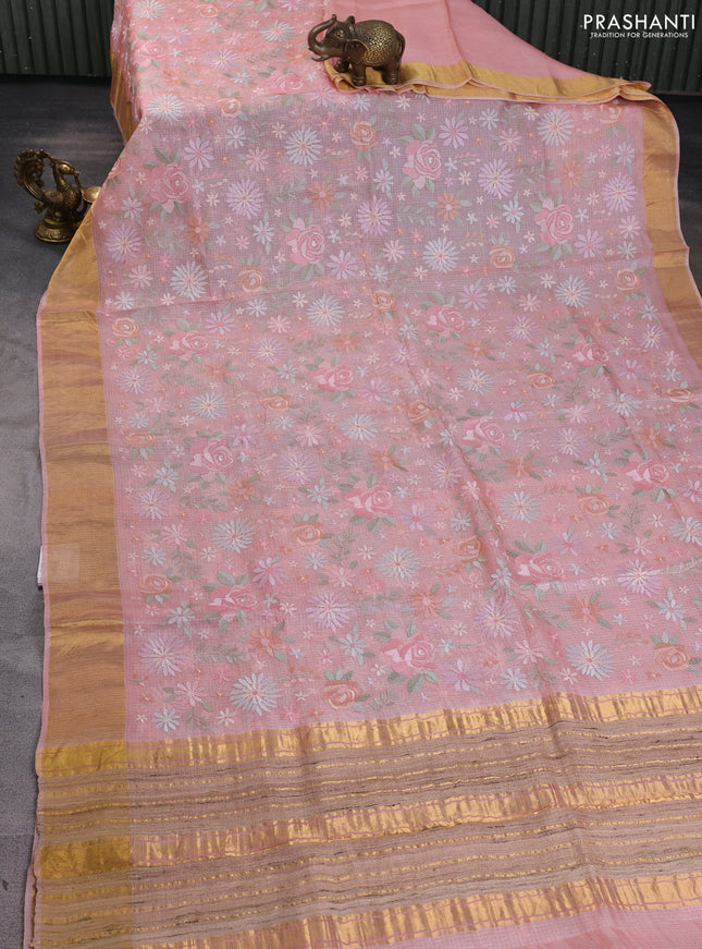 Silk kota saree peach shade with allover floral embroidery work and zari woven border