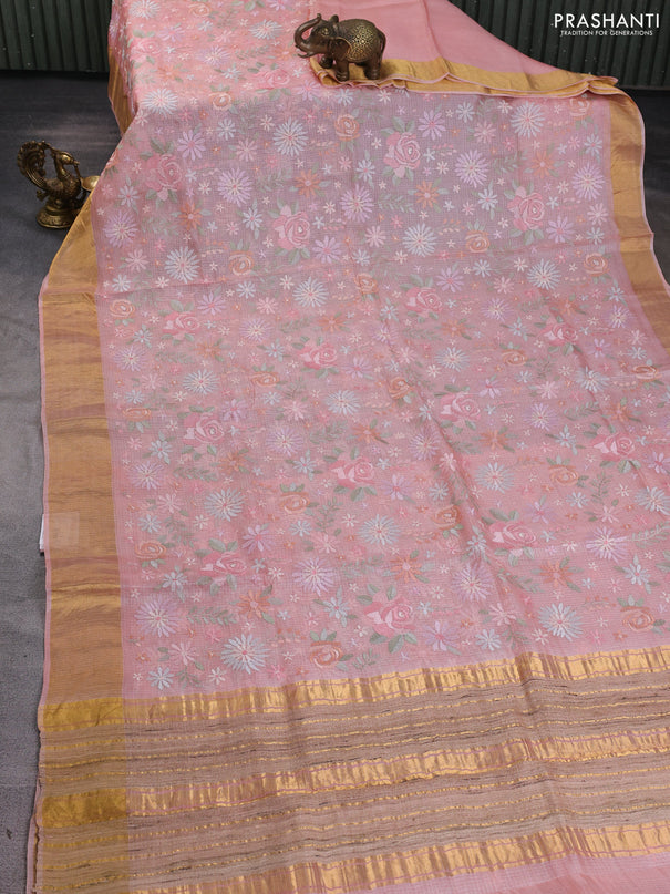 Silk kota saree peach shade with allover floral embroidery work and zari woven border