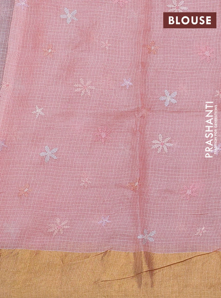 Silk kota saree peach shade with allover floral embroidery work and zari woven border