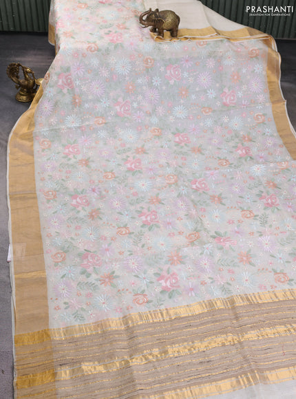 Silk kota saree cream with allover floral embroidery work and zari woven border