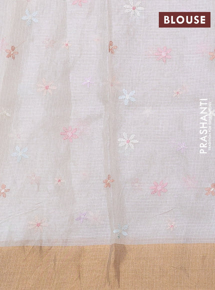 Silk kota saree cream with allover floral embroidery work and zari woven border