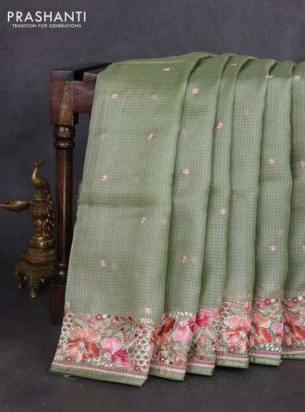 Silk kota saree pastel green with embroidery work buttas and floral embroidery work border