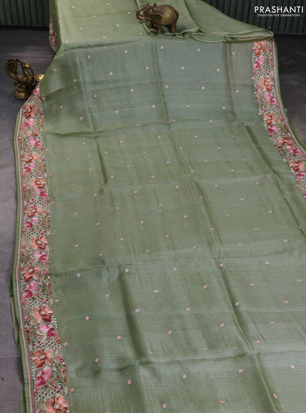 Silk kota saree pastel green with embroidery work buttas and floral embroidery work border