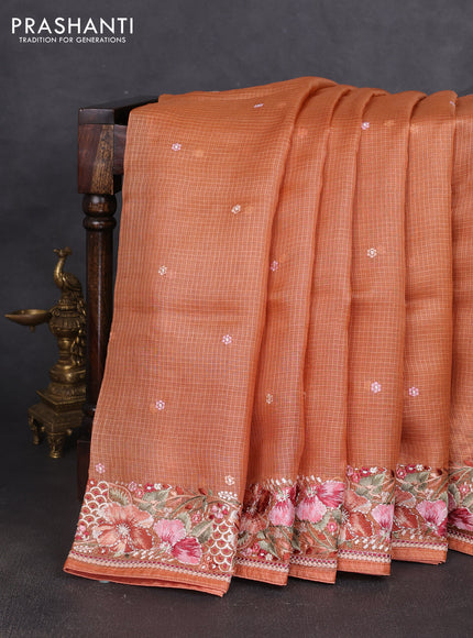 Silk kota saree rust shade with embroidery work buttas and floral embroidery work border