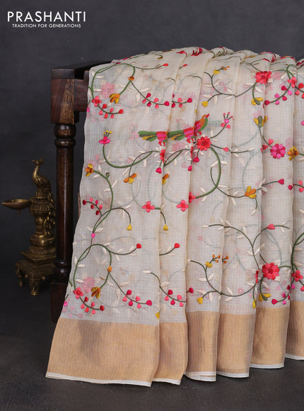 Silk kota saree cream with allover floral embroidery work and zari woven border