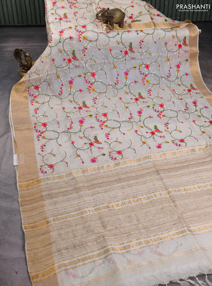 Silk kota saree cream with allover floral embroidery work and zari woven border
