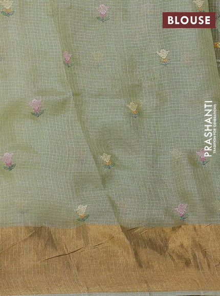 Silk kota saree pista green with allover embroidery work and zari woven border