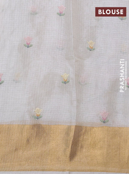 Silk kota saree off white with allover embroidery work and zari woven border