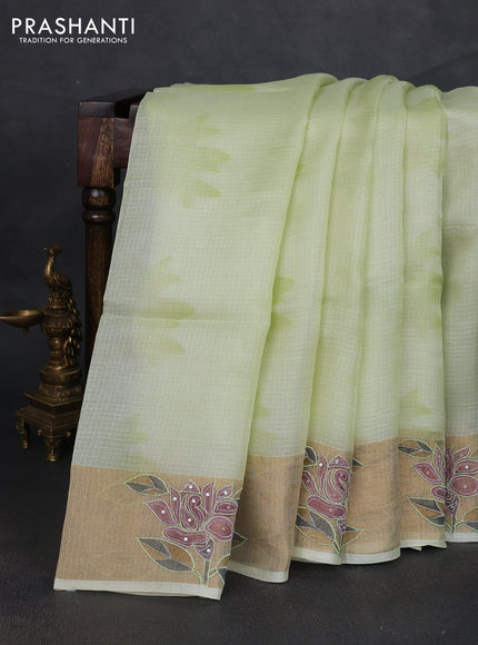 Silk kota saree pista green with prints and zari woven embroidery border