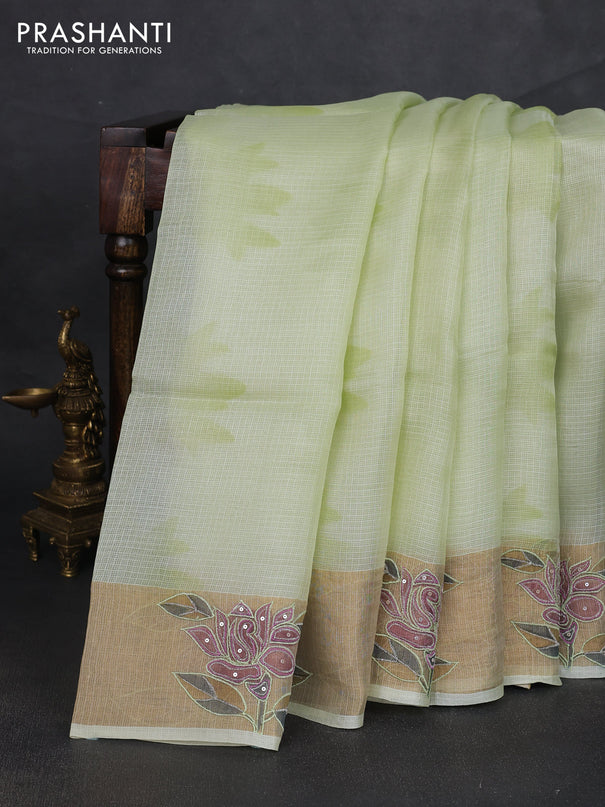 Silk kota saree pista green with prints and zari woven embroidery border