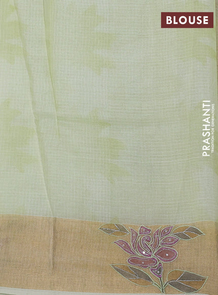 Silk kota saree pista green with prints and zari woven embroidery border