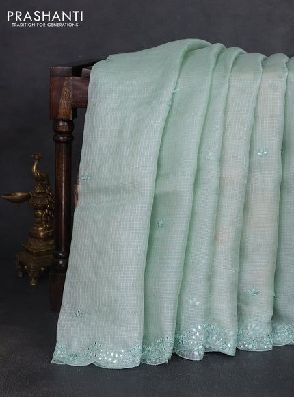 Silk kota saree pastel green and cream with mirror embroidery buttas and mirror embroidery work border