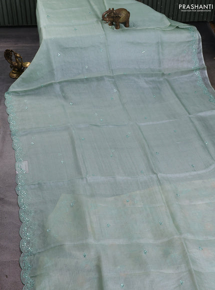 Silk kota saree pastel green and cream with mirror embroidery buttas and mirror embroidery work border
