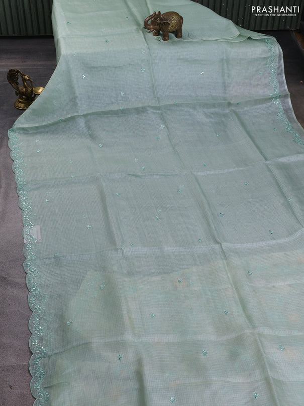 Silk kota saree pastel green and cream with mirror embroidery buttas and mirror embroidery work border