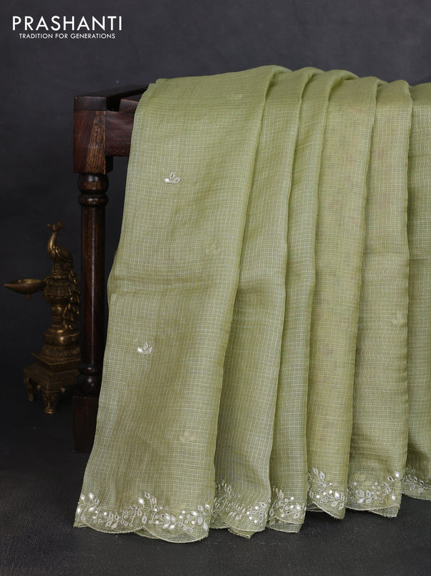 Silk kota saree pista green and cream with mirror embroidery buttas and mirror embroidery work border