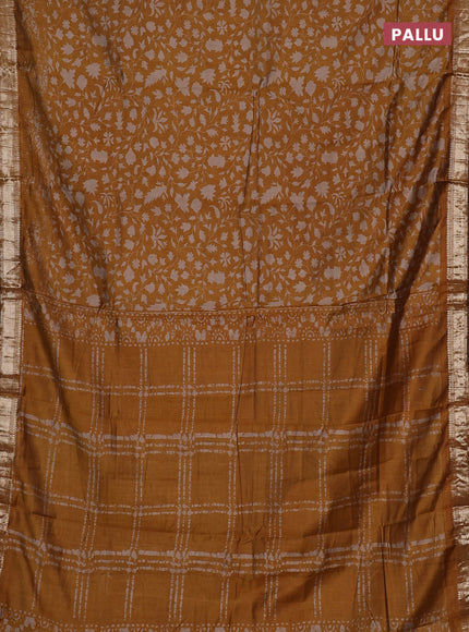 Semi maheswari cotton saree mustard yellow with allover prints and zari woven border