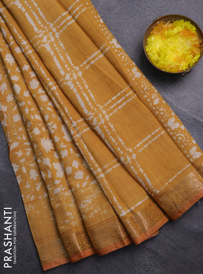 Semi maheswari cotton saree mustard yellow with allover prints and zari woven border