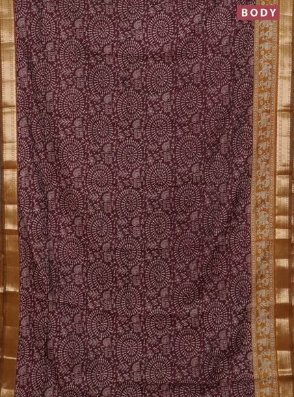 Semi maheswari cotton saree maroon and dark mustard with allover warli prints and zari woven border