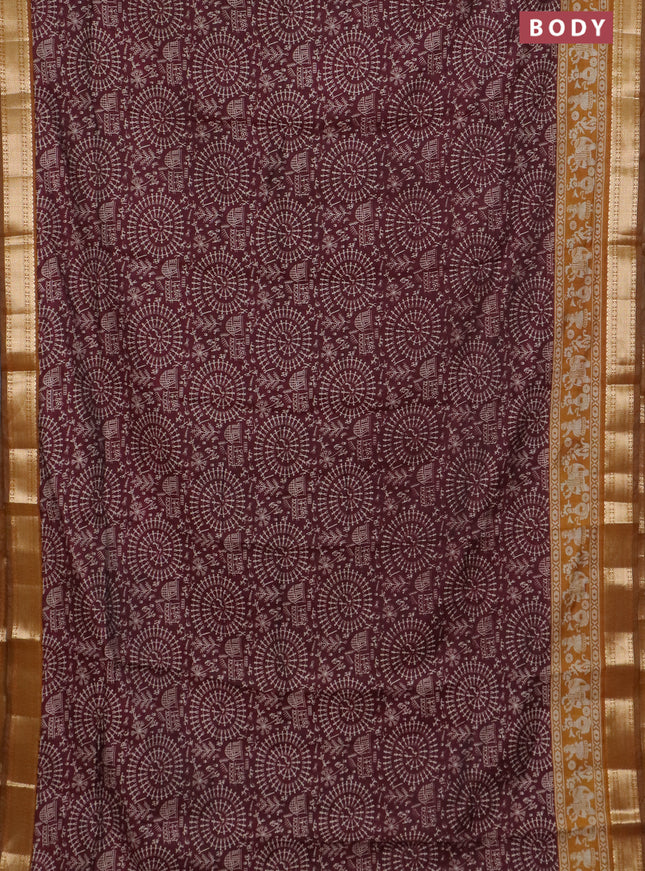 Semi maheswari cotton saree maroon and dark mustard with allover warli prints and zari woven border