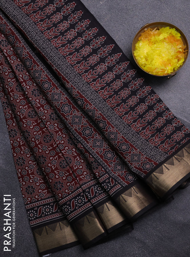 Semi maheswari cotton saree maroon and black with allover ajrakh prints and zari woven border