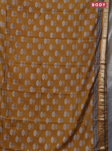 Semi maheswari cotton saree mustard yellow with allover floral prints and zari woven border