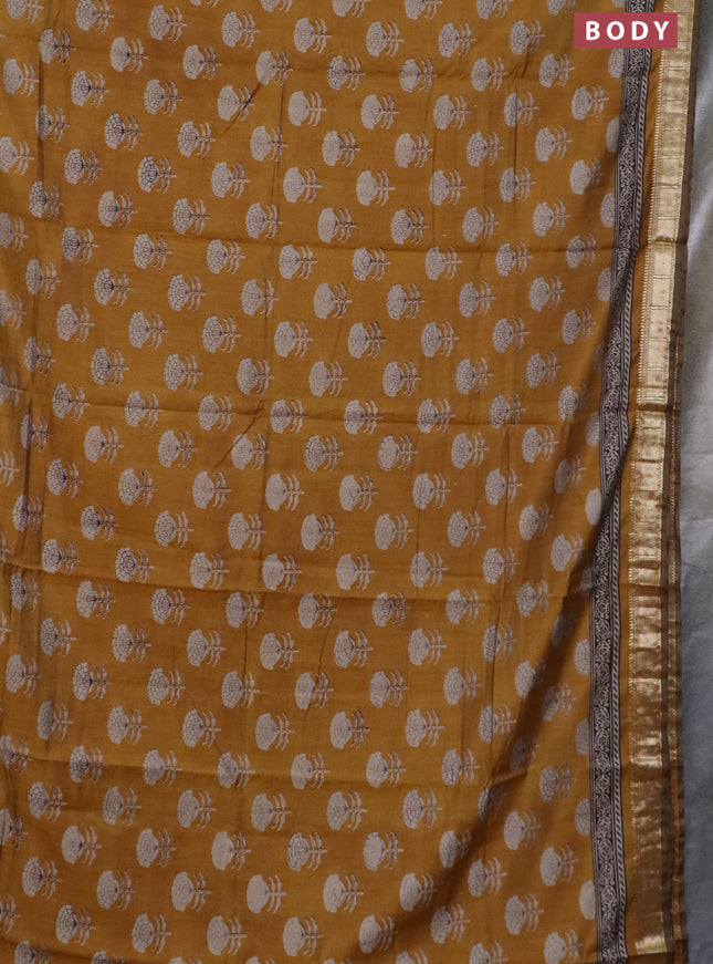 Semi maheswari cotton saree mustard yellow with allover floral prints and zari woven border