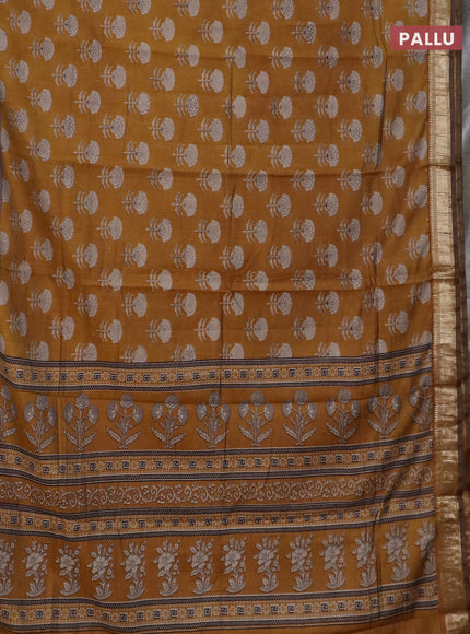 Semi maheswari cotton saree mustard yellow with allover floral prints and zari woven border