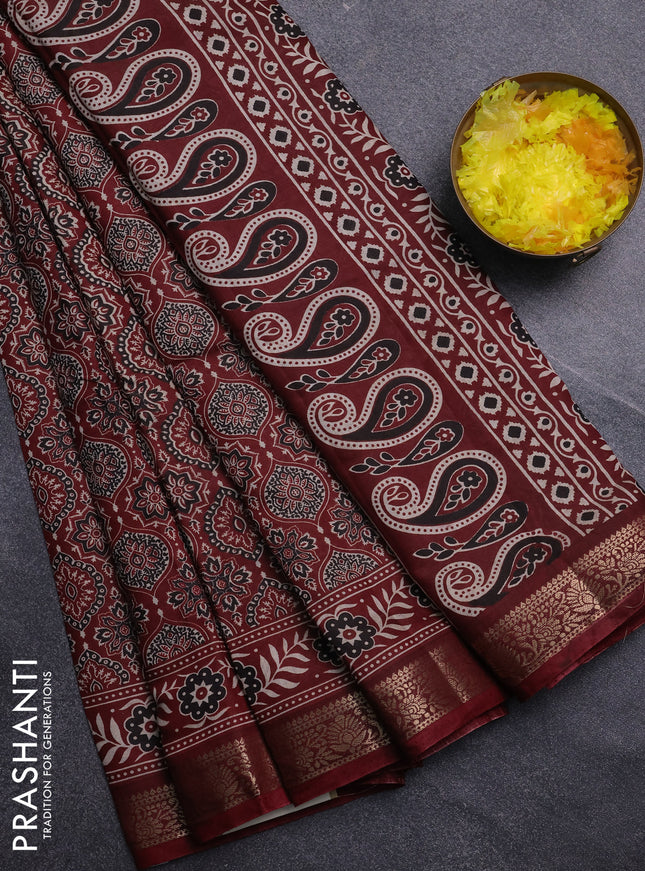 Semi maheswari cotton saree maroon with allover ajrak prints and zari woven border