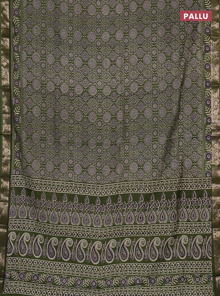 Semi maheswari cotton saree sap green with allover ajrak prints and zari woven border