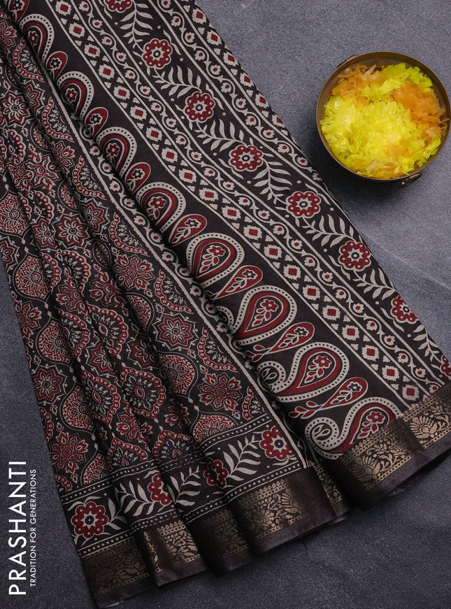 Semi maheswari cotton saree black with allover ajrak prints and zari woven border