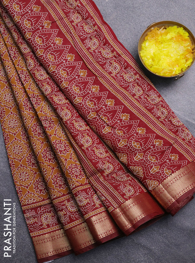 Semi maheswari cotton saree mustard yellow and deep maroon with allover prints and zari woven border