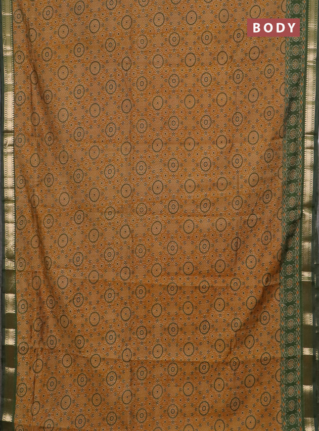 Semi maheswari cotton saree mustard yellow and sap green with allover ajrak prints and zari woven border