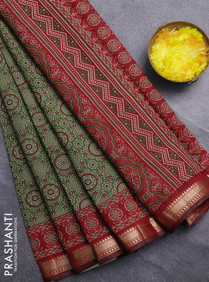 Semi maheswari cotton saree sap green and maroon with allover ajrak prints and zari woven border