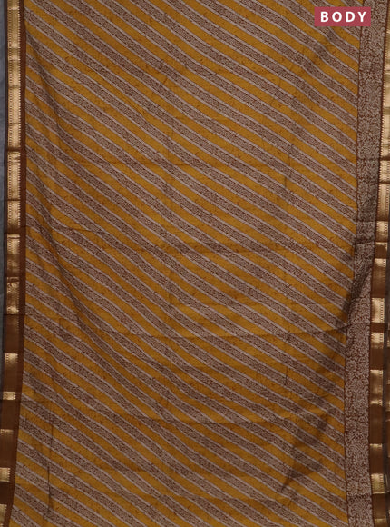 Semi maheswari cotton saree mustard yellow with allover prints and zari woven border
