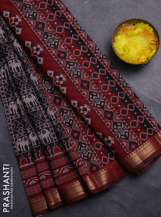 Semi maheswari cotton saree black and maroon with allover patola prints and zari woven border