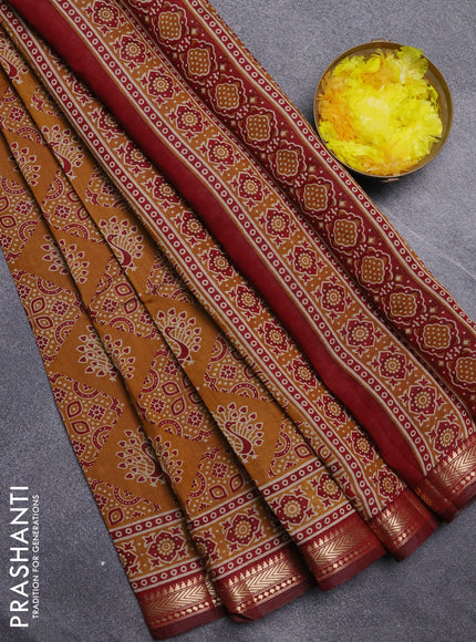 Semi maheswari cotton saree dark mustard and maroon with allover ajrakh prints and zari woven border