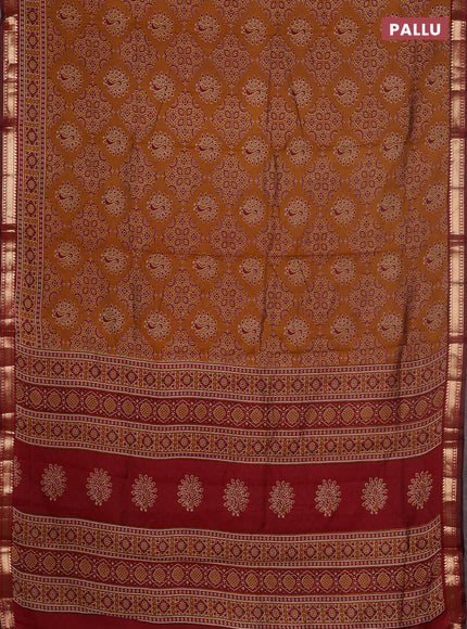Semi maheswari cotton saree dark mustard and maroon with allover ajrakh prints and zari woven border