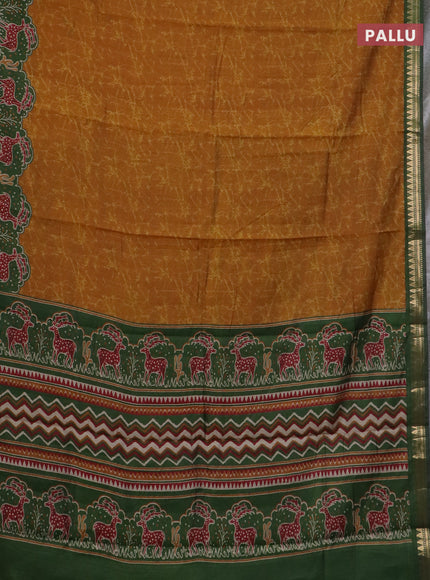 Semi maheswari cotton saree dark mustard and sap green with allover batik prints and zari woven border