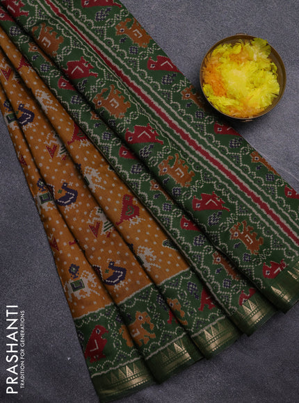 Semi maheswari cotton saree dark mustard and sap green with allover patola prints and zari woven border