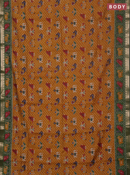 Semi maheswari cotton saree dark mustard and sap green with allover patola prints and zari woven border