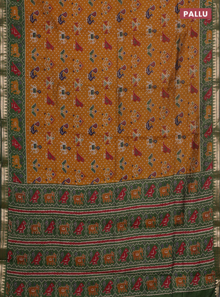 Semi maheswari cotton saree dark mustard and sap green with allover patola prints and zari woven border