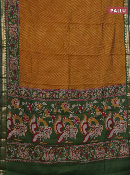 Semi maheswari cotton saree dark mustard and sap green with allover ikat prints and zari woven border