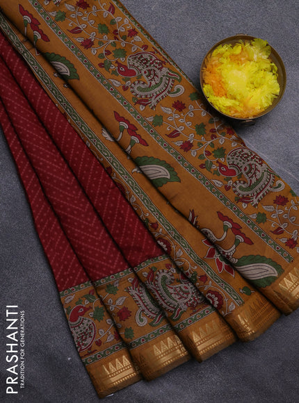 Semi maheswari cotton saree maroon and dark mustard with allover ikat prints and zari woven border