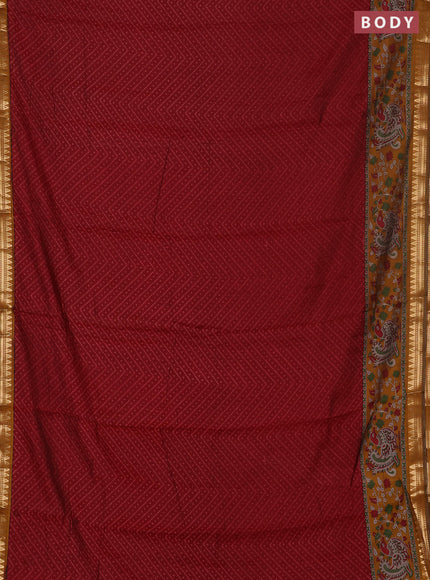 Semi maheswari cotton saree maroon and dark mustard with allover ikat prints and zari woven border