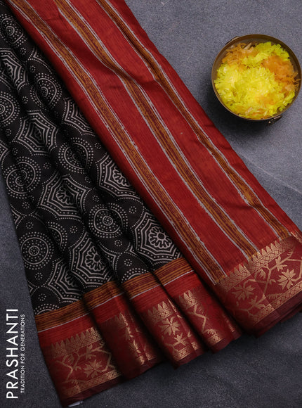 Semi maheswari cotton saree black and maroon with allover prints and zari woven border