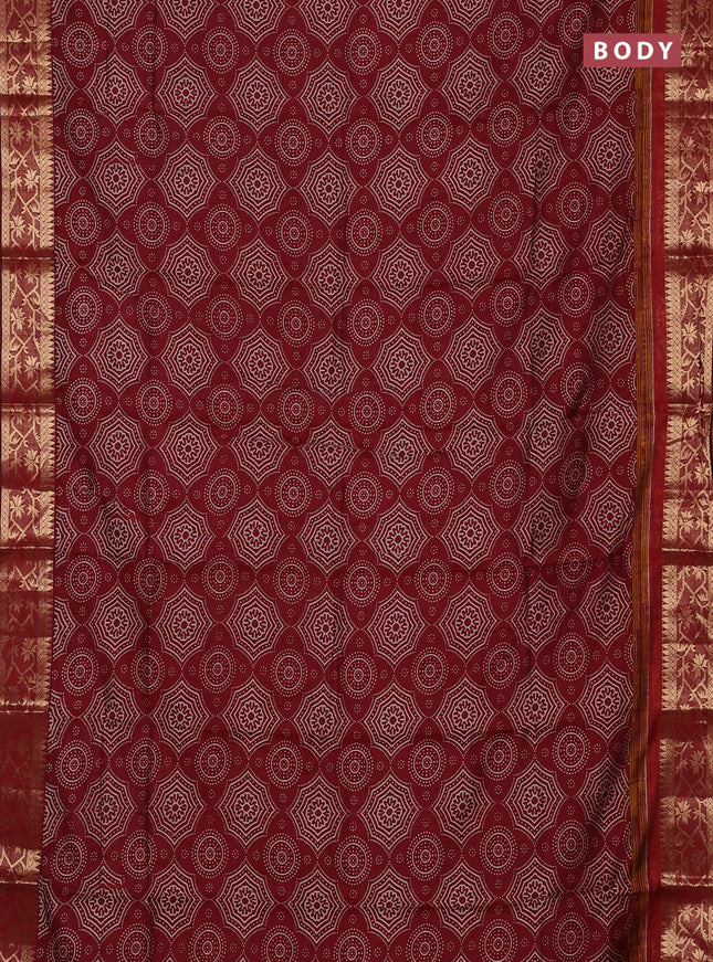 Semi maheswari cotton saree maroon with allover prints and zari woven border