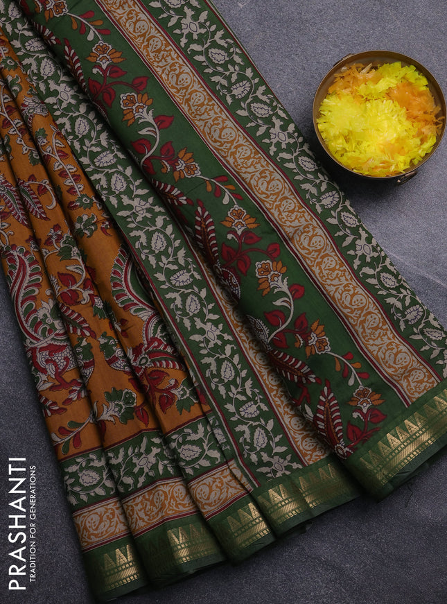 Semi maheswari cotton saree dark mustard and sap green with allover kalamkari prints and zari wovem border